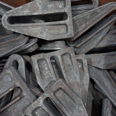 Pile of forged steel parts showing clean edges and durable surface finish, highlighting SSP’s precision forging capabilities and material consistency.